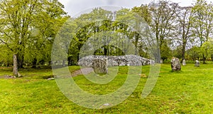 A view of standing stones and ancient burial tombs at Clava Cairns outside Inverness, Scotland