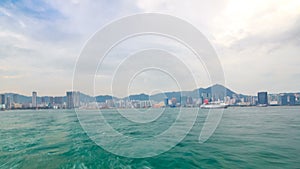 View from Star Ferry through Victoria Harbour timelapse hyperlapse, with the skyline of Hong Kong as backdrop
