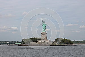 A view of The Statue of Liberty, on Liberty Island, from a water taxi, in New York Harbor
