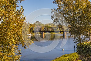 View of a steel train track bridge on the Savannah River photo