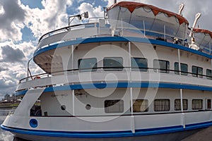 Stern of river cruise ship with lifeboats