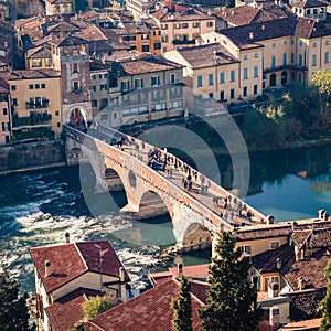 View of the stone bridge that crosses the Adige river in Verona.