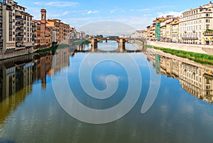 View of stone bridge over Arno river in Florence, Tuscany, Italy.