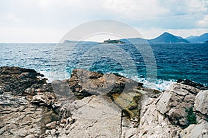 View from the stone coast of Montenegro to the island of Mamula