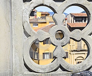 view through the stone fence city houses abstraction color background geometry beautiful