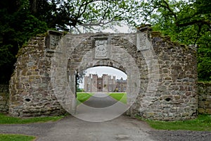 View through stone gate towards Scone Palace