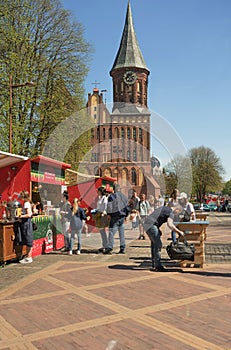 View of store fronts of food fair and Cathedral on Kants island