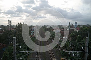 View of straight railroad double tracks