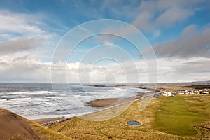 View from on Strandhill beach, county Sligo, Ireland. Warm sunny day with beautiful sky. Powerful Atlantic ocean