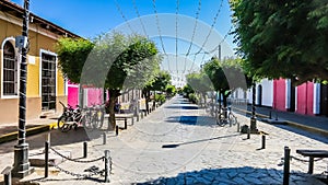 View of Street with colourful houses, Granada, founded in 1524, Nicaragua, Central America