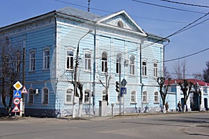 A view of the street with a residential wooden house in a provincial town of Zaraysk, Moscow region