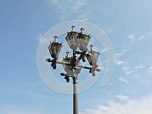 View of streetlamps on embankment and blue sky in summer Tallinn