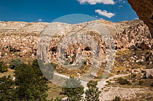 View from the structure of Cappadocia. Impressive fairy chimneys of sandstone in the canyon near Cavusin village, Cappadocia.