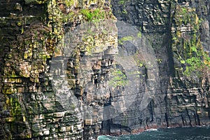 View on Structure of Cliff of Moher, county Clare, Ireland. Epic landscape with magnificent scenery. Irish landmark and popular