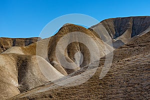 View of the structure and colors, of the jagged rolling beautiful bare mountains of the Judea desert Israel.