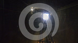 View of a subway tunnel as seen from the front of a moving train