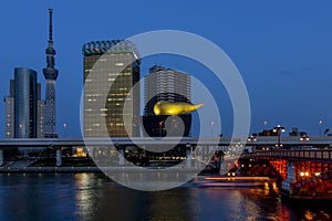 View of the Sumida district of Tokyo from the Sumida river, Japan, in the blue hour