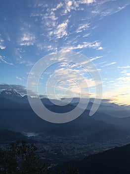 View of Sunrise above Himalayan Mountains from Sarangkot in Nepal.