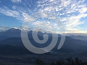 View of Sunrise above Himalayan Mountains from Sarangkot in Nepal.