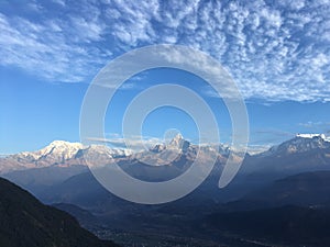 View of Sunrise above Himalayan Mountains from Sarangkot in Nepal.