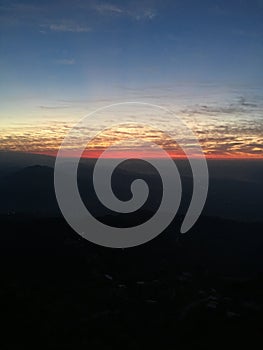 View of Sunrise above Himalayan Mountains from Sarangkot in Nepal.