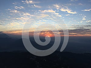 View of Sunrise above Himalayan Mountains from Sarangkot in Nepal.