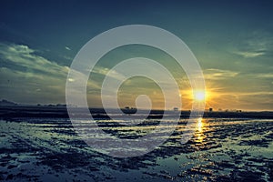 View of Sunrise and clouds in the sky by the river