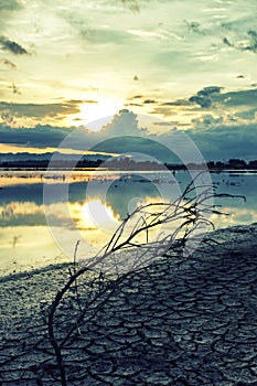 View of Sunrise and clouds in the sky by the river