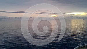 View of sunrise over Brabant Island, seen from a cruise ship, Antarctica.