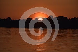 The view of the sunrise over the meadows and great river 6.