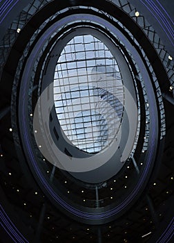 A view through a sunroof of a tall building Sky Tower in Wroclaw