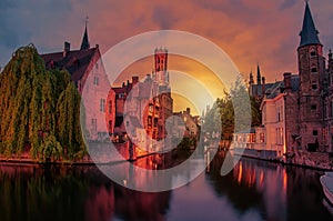 View of sunset over Bruges old town and Belfry tower at night, Bruges, Belgium