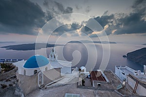 View of the sunset over the caldera, Catholic Church, Fira, Thira, Santorini, Greece