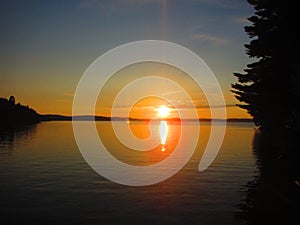 View of a sunset over a freshwater lake in North America
