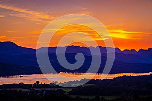 View of sunset over Windermere in Lake District, a region and national park in Cumbria in northwest England