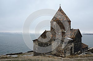 View of Surb Arakelots church in winter, Sevanavank, Armenia