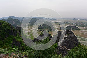 View of surrounding landscape from famous Hang Mua peak in Vietnam