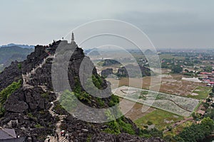 View of surrounding rice field landscape from famous Hang Mua peak in Vietnam