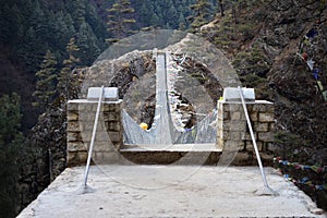 View from the suspension bridge over Dudh Koshi River on route to Namche Bazar, Khumjung, Solu Khumbu, Nepal. photo