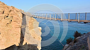 Suspension bridge in Torrenueva Beach, Granada photo
