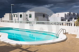 View of the swimming pool in the urbanization Playa Blanca,Lanzarote