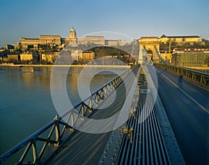 View from the SzÃÂ©chenyi Chain Bridge during sunrise photo