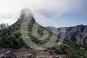 View of the Taborno mountain in the clouds in National Park Anaga, Tenerife, Canary Islands, Spain. photo