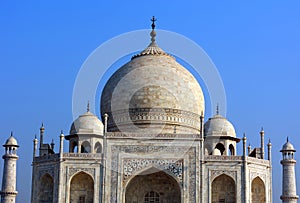 View of the Taj Mahal at sunrise is an ivory-white marble mausoleum