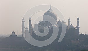 View of the Taj Mahal at sunrise is an ivory-white marble mausoleum