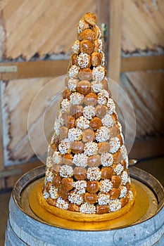 View of a tall croquembouche wedding cake
