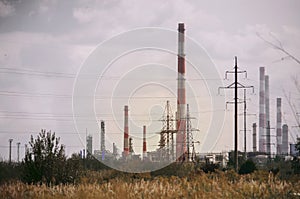 View of tall oil  refinery pipes in summer on a clear day