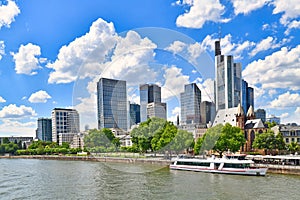 View on tall skyscrapers of financial district of modern Frankfurt city center and Main river in Germany