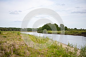 View of the Tara river, Omsk region, Siberia, Russia. Surroundings of the Siberian expanses.