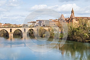 View at the Tarn river with old bridge in Montauban, France photo